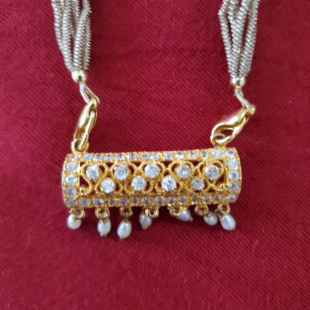 Elegant Gold and Silver Necklace with Pearl Accents